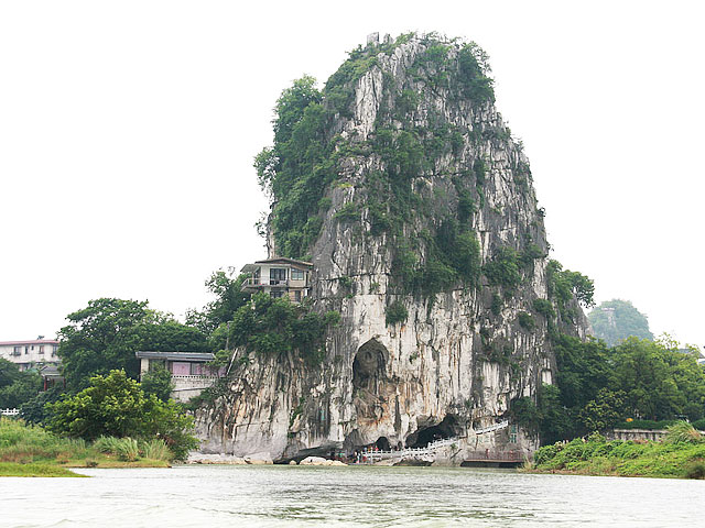 Fubo Hill standing ont the bank of Li River is a should-not-miss sight in Guilin