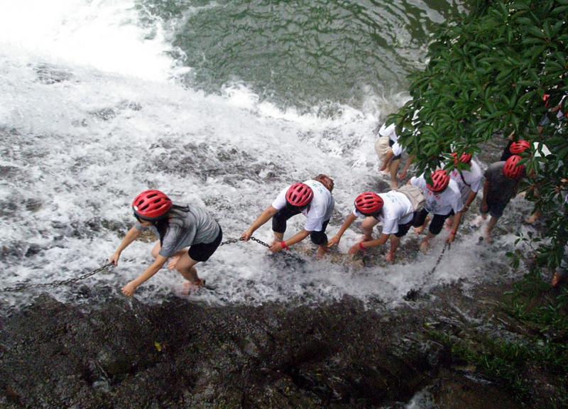 Climb the waterfall at Gudong scenic area,Guilin China