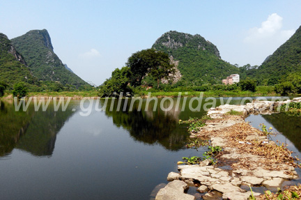 Guilin city and countryside biking, ride bike to see the rice fields.