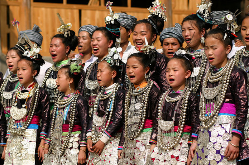 Miao people are performing the incredible Grand Song