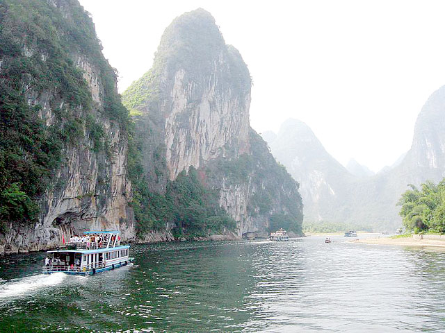 Take a Li River Cruise to admire the surreal Karst landscape