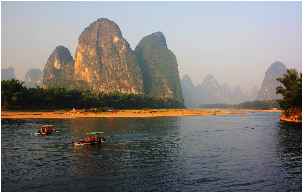 Take a bamboo rafting to tour the best part of Li River